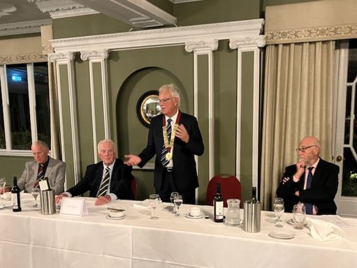The President addressing the attendees with Philip Bell the new Nat,Sec,(on the right) keeping a watchful eye!